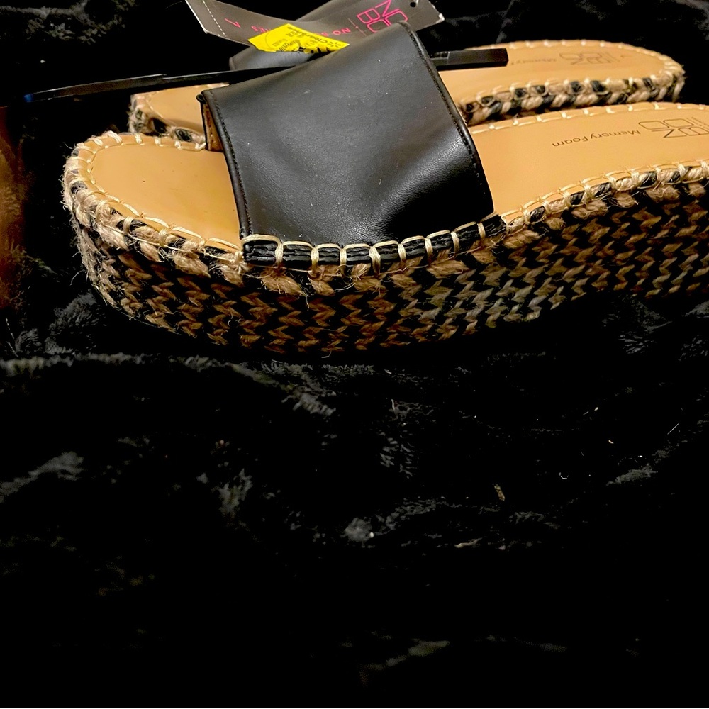 Black and tan woven soles sandals